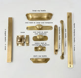 Unlacquered Aged Brass Solid Knobs. Luxury Collection of Knobs, Handles & Backplates. Premium Hardware with Rich Sophistication. Transform Kitchens, Cabinets, Doors and More.